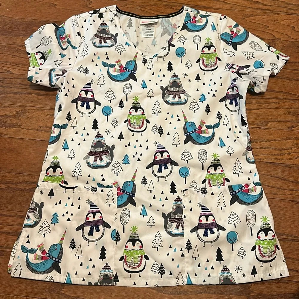 Scrubstar winter themed scrub top size small with walrus narwhal and penguin